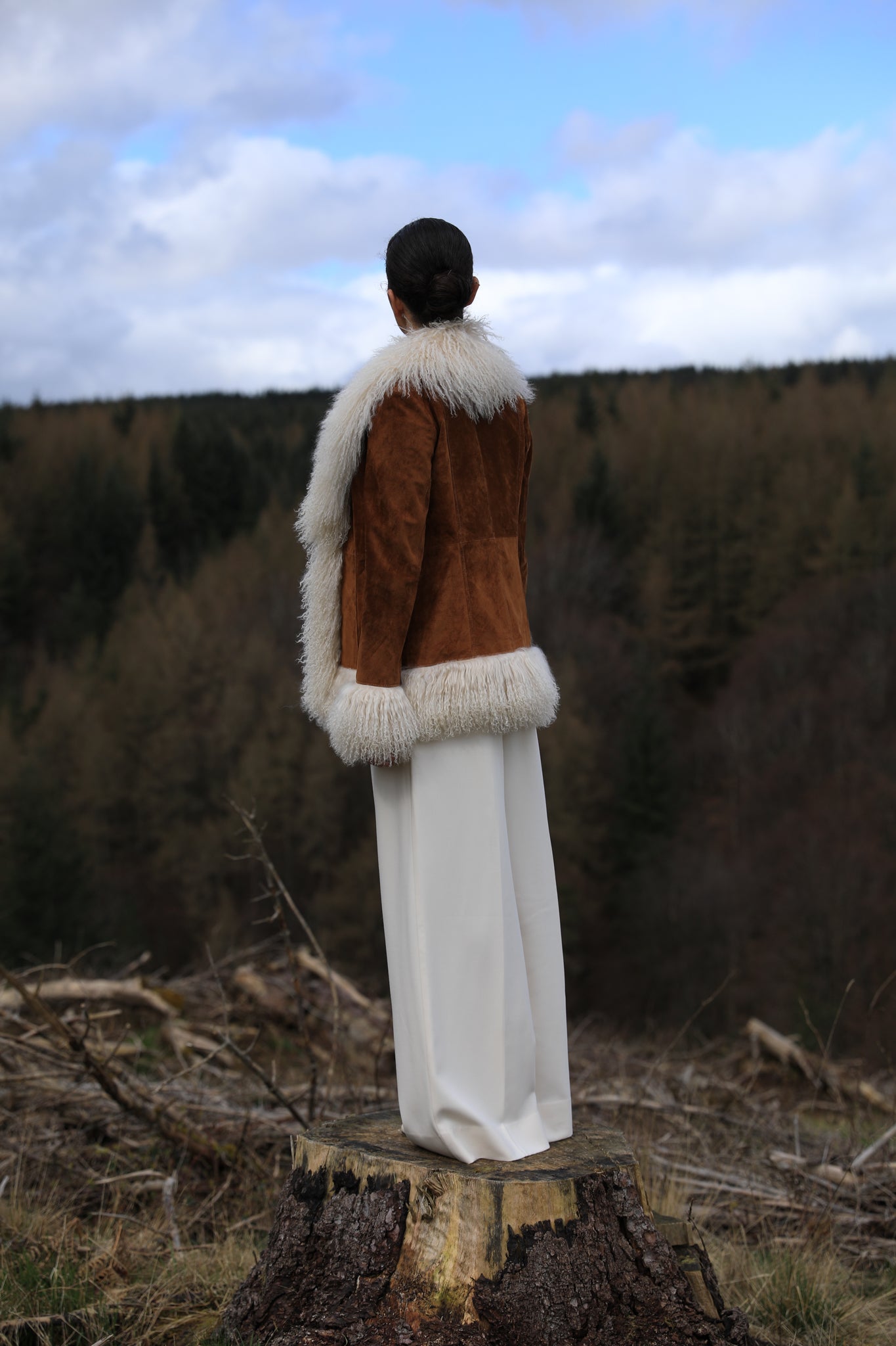 Josephine Jones tan suede Afghan Penny Lane style jacket with ivory Mongolian fur trims. A timeless classic in genuine suede, exuding elegance and warmth.