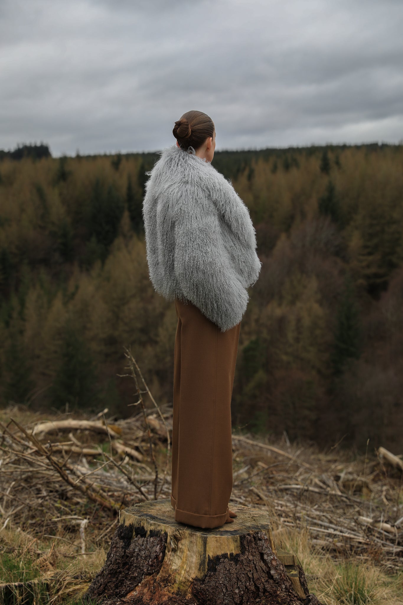 A sophisticated grey voluminous collar Mongolian fur coat from Josephine Jones, a timeless staple piece exuding elegance and luxury.