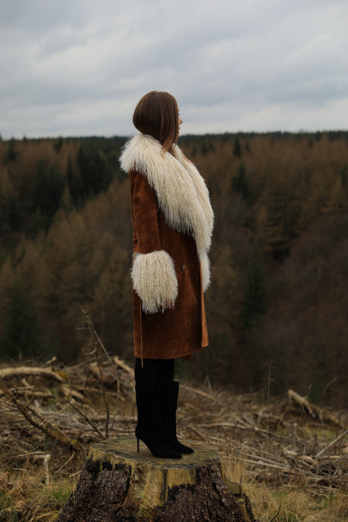 Tan genuine suede trench wrap coat with ivory Mongolian collar and cuffs, a luxurious creation from Josephine Jones, adding sophistication and warmth to any ensemble.