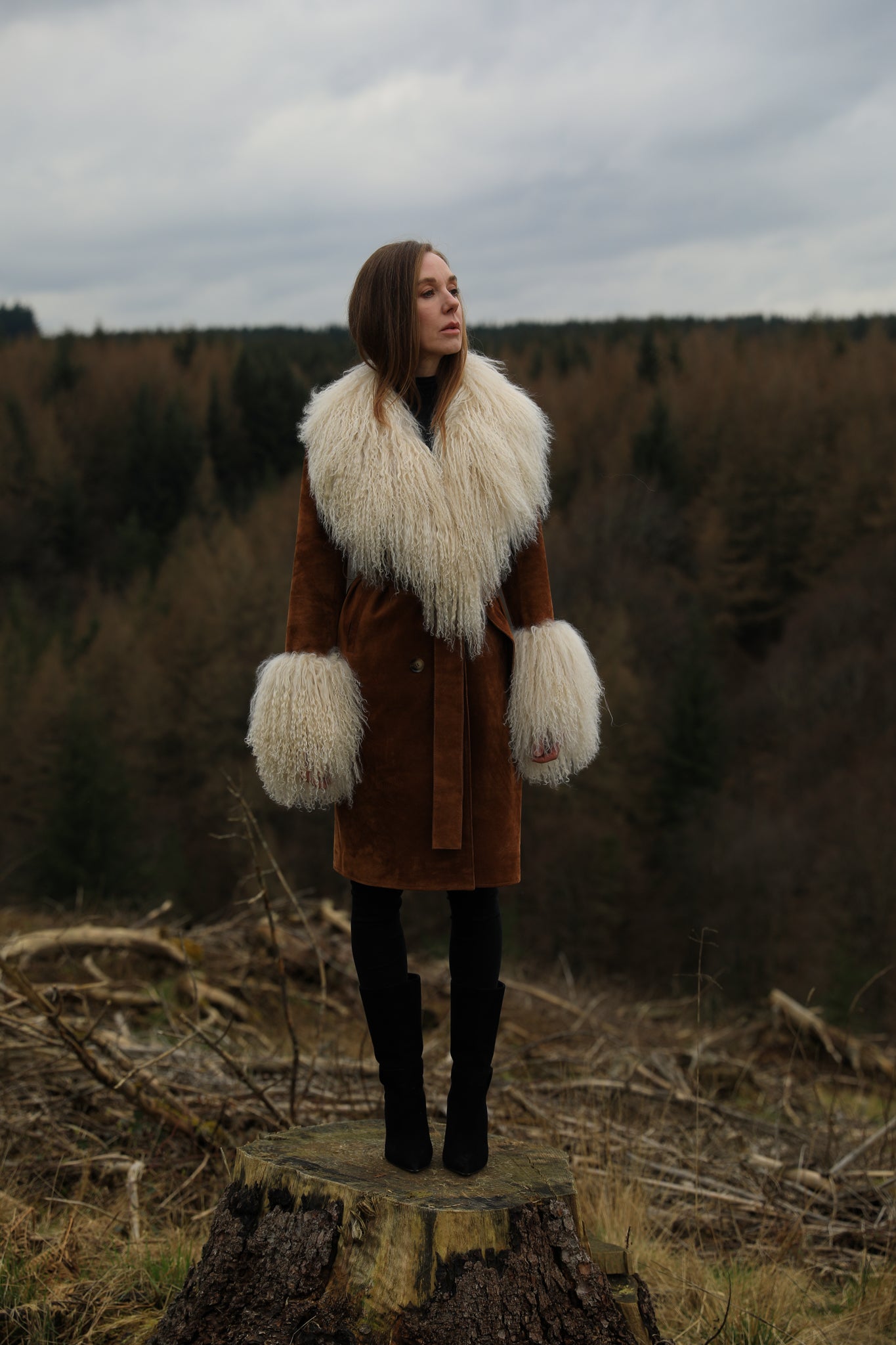 Tan genuine suede trench wrap coat with ivory Mongolian collar and cuffs, a luxurious creation from Josephine Jones, adding sophistication and warmth to any ensemble.