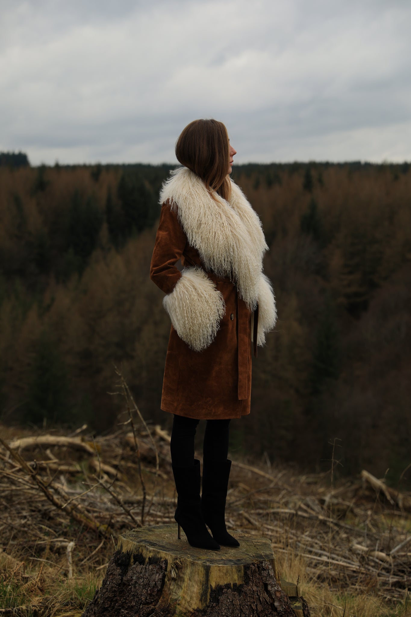 Tan genuine suede trench wrap coat with ivory Mongolian collar and cuffs, a luxurious creation from Josephine Jones, adding sophistication and warmth to any ensemble.