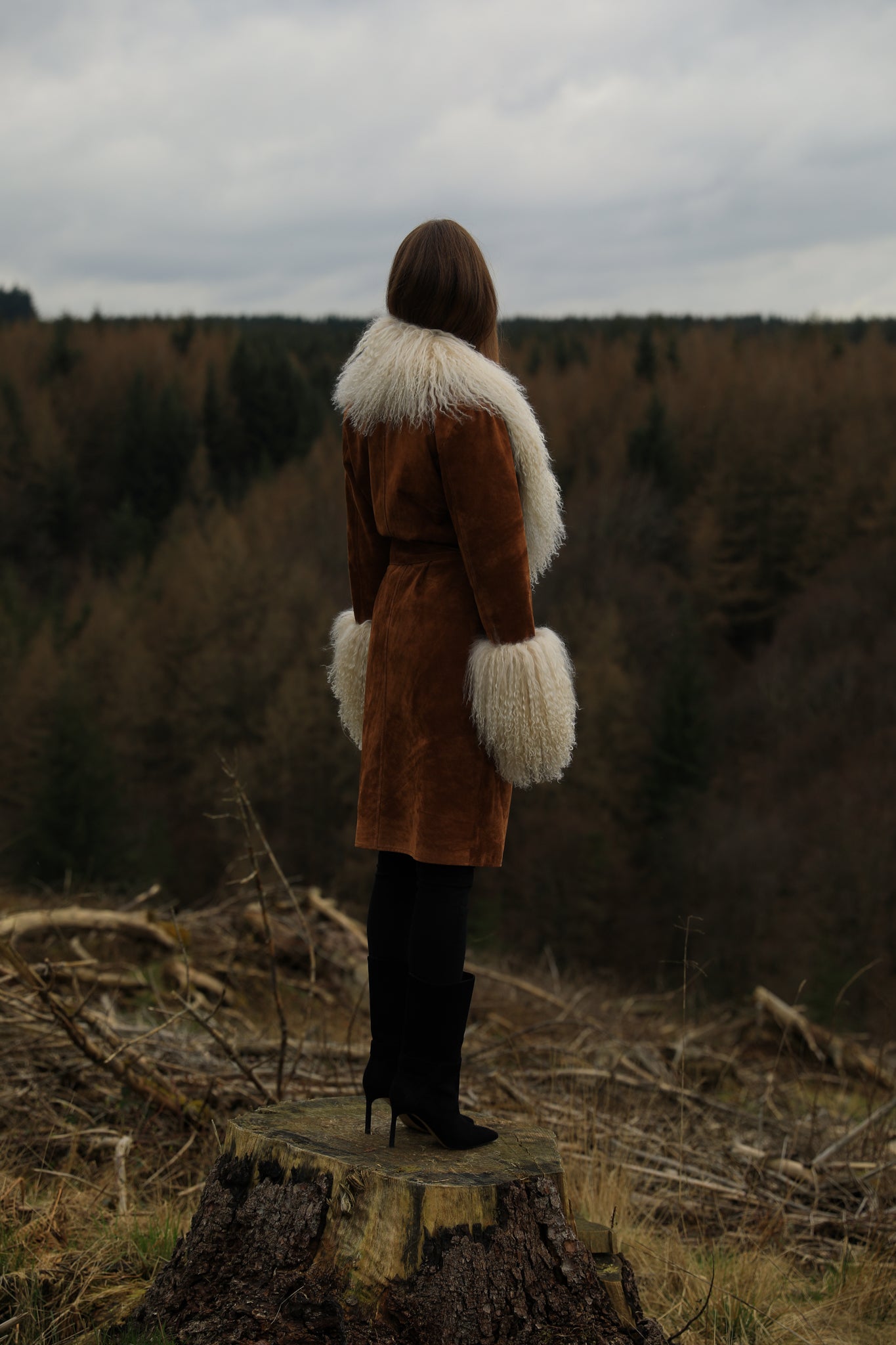 Tan genuine suede trench wrap coat with ivory Mongolian collar and cuffs, a luxurious creation from Josephine Jones, adding sophistication and warmth to any ensemble.