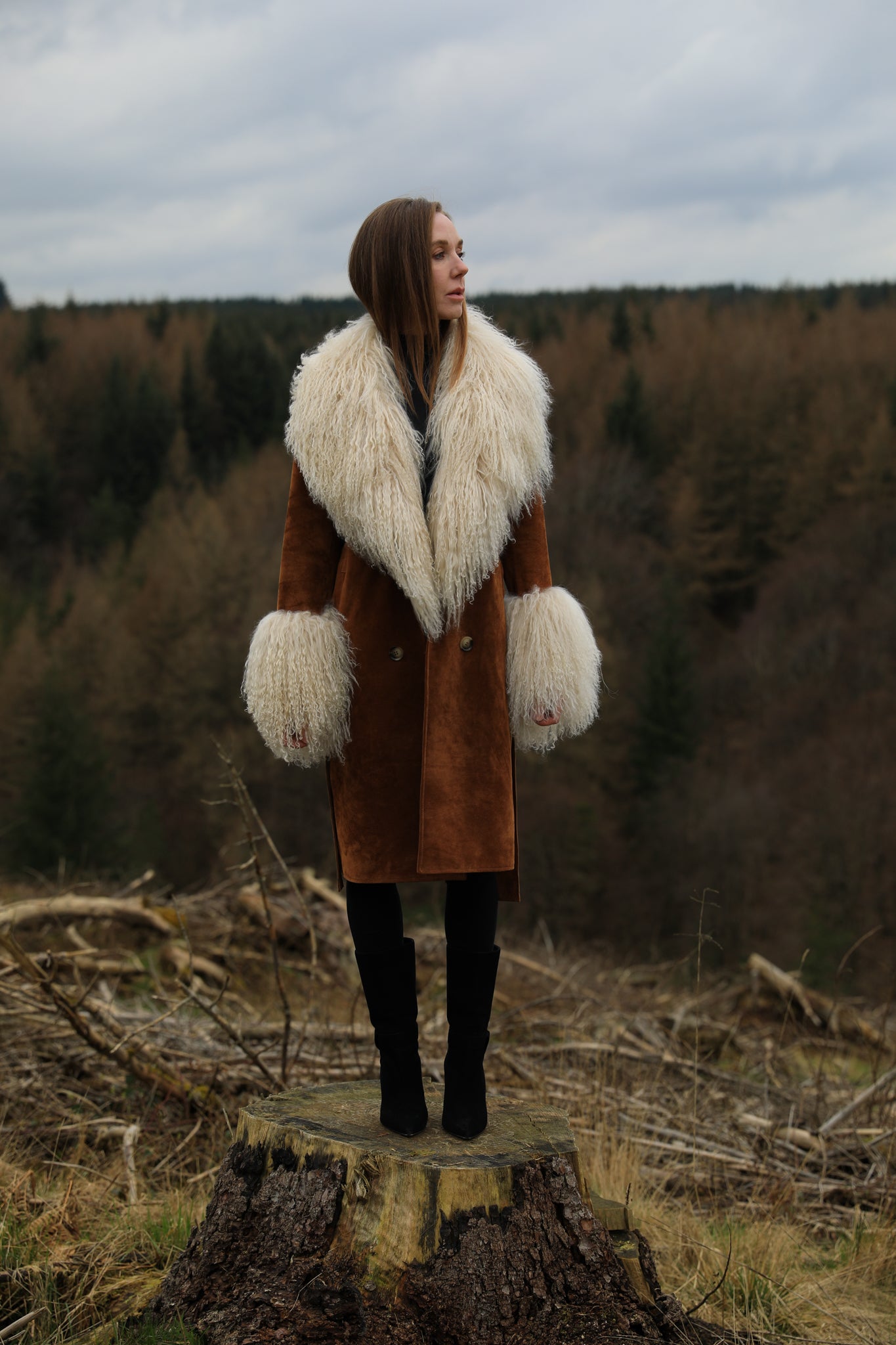 Tan genuine suede trench wrap coat with ivory Mongolian collar and cuffs, a luxurious creation from Josephine Jones, adding sophistication and warmth to any ensemble.