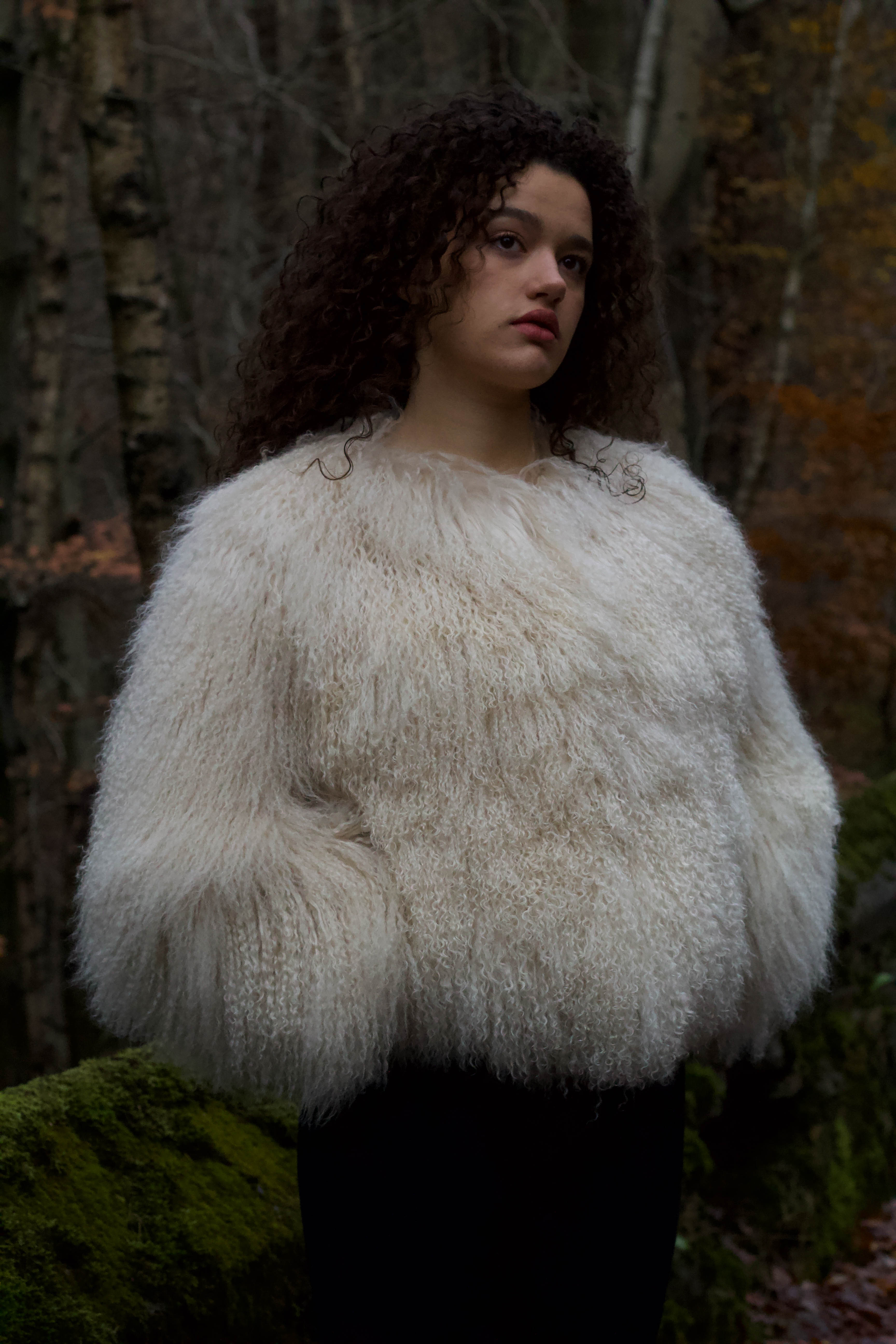 Josephine Jones Ivory Mongolian Fur Coat' - Luxurious ivory Mongolian fur coat designed by Josephine Jones, showcasing exquisite craftsmanship and unparalleled elegance.