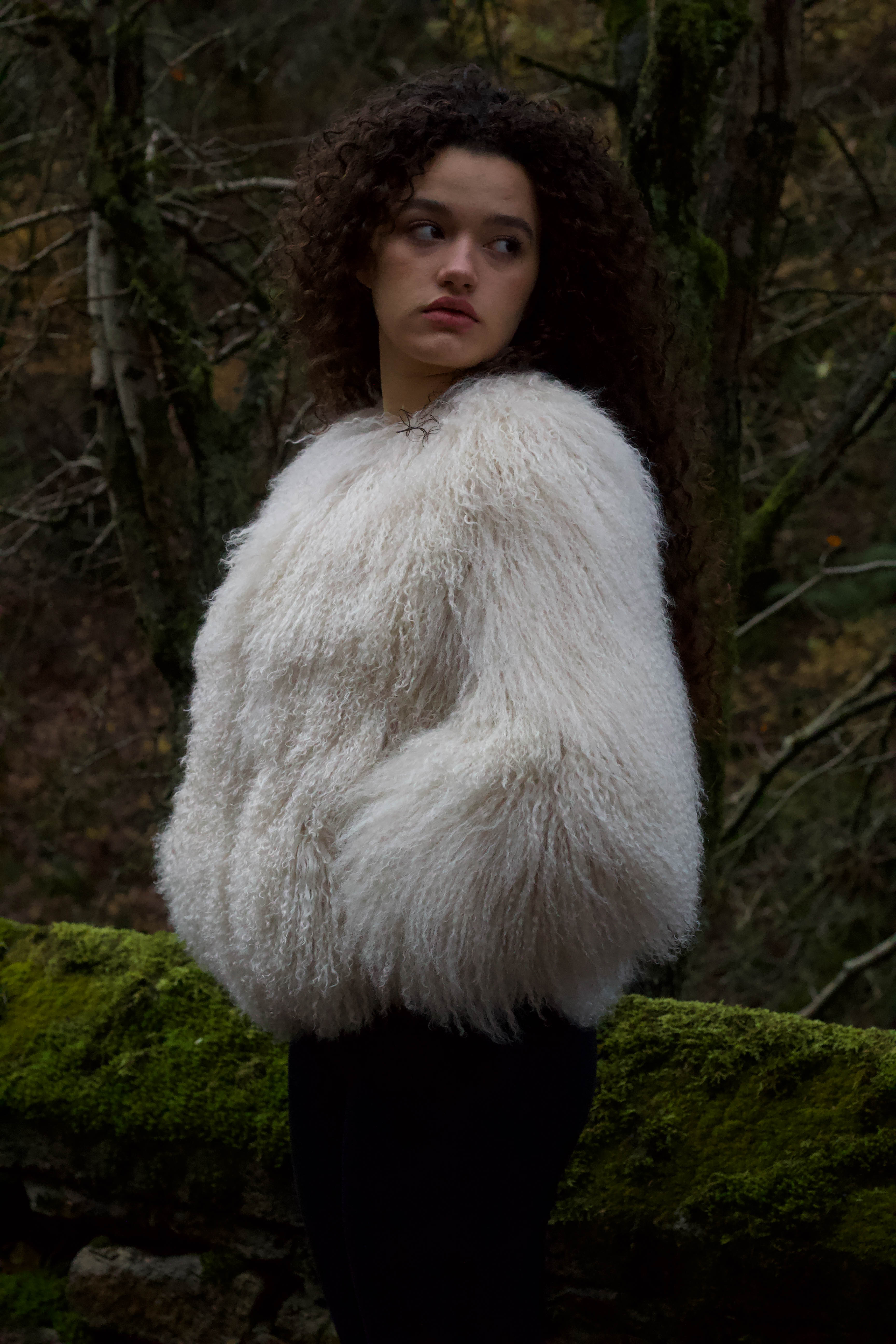 Josephine Jones Ivory Mongolian Fur Coat' - Luxurious ivory Mongolian fur coat designed by Josephine Jones, showcasing exquisite craftsmanship and unparalleled elegance.